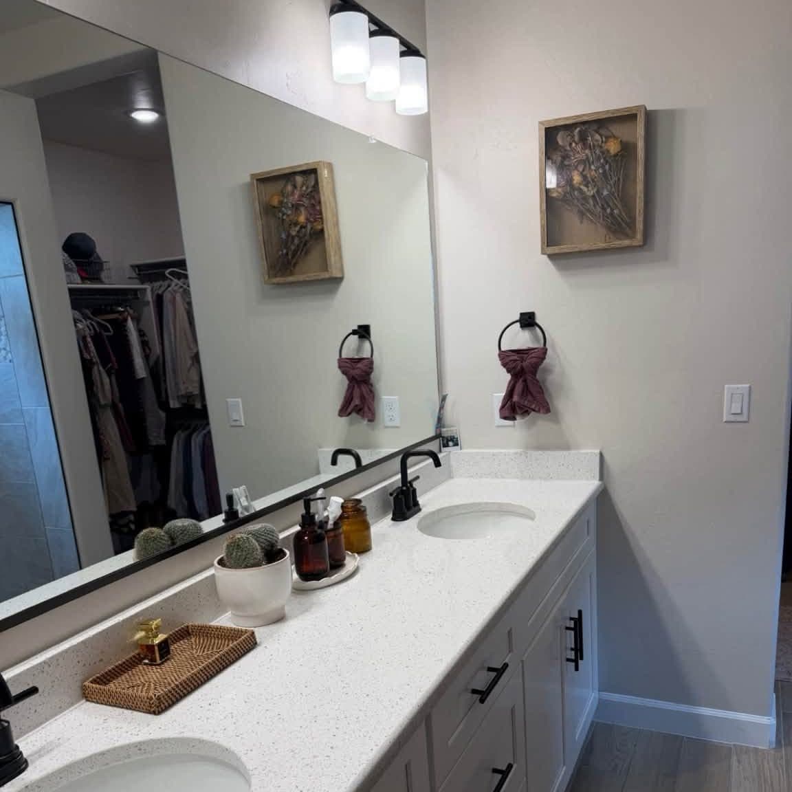 Bathroom vanity with a streak-free mirror after a recurring house cleaning