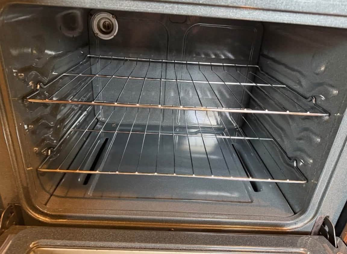 Clean oven interior with shining racks after an oven deep cleaning by Kat's Cleaning Services